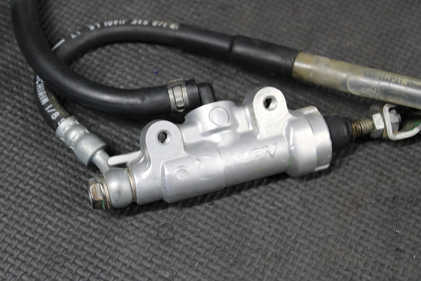 1995 KAWASAKI KX80 OEM NISSIN REAR BACK BRAKE CALIPER MASTER CYLINDER ASSEMBLY - hggarage