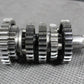 2003 SUZUKI RM100 OEM ENGINE TRANSMISSION TRANNY ASSEMBLY GEARS K1312-71261