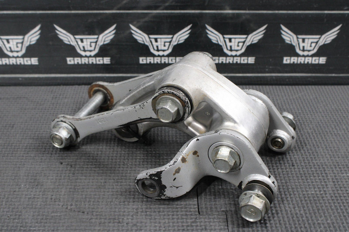 2014 KAWASAKI KX100 OEM REAR SHOCK LINKAGE RELAY ARM DOGBONE ASSEMBLY - hggarage