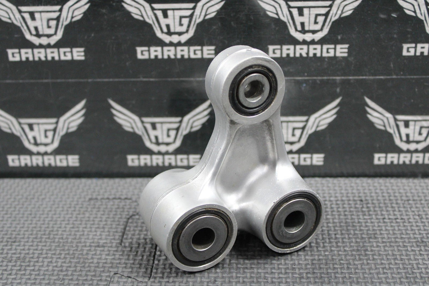 2003 2004 HONDA CRF450R OEM REAR SHOCK LINKAGE CUSHION ARM 52465 - MEB - 750 - hggarage