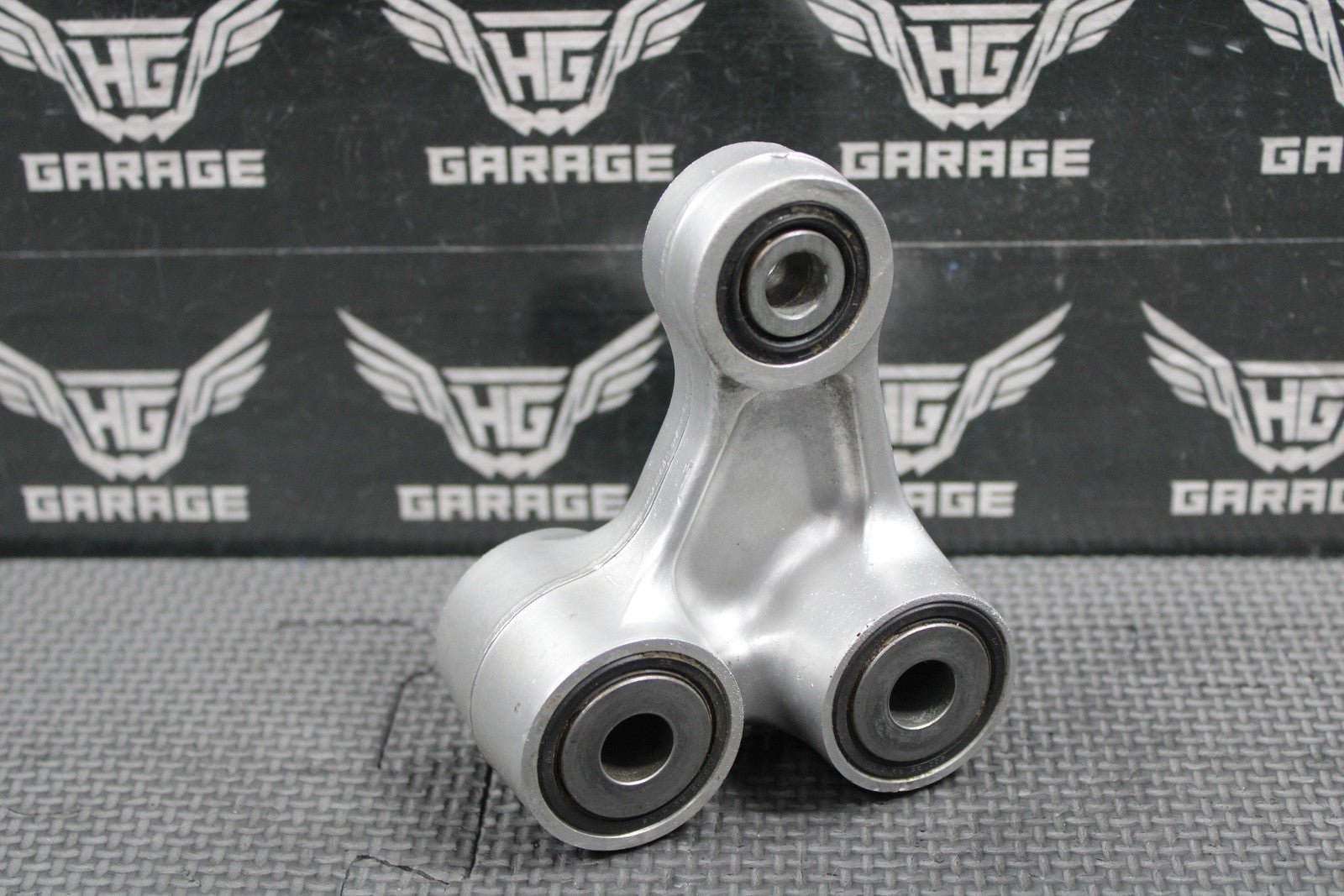 2003 2004 HONDA CRF450R OEM REAR SHOCK LINKAGE CUSHION ARM 52465 - MEB - 750 - hggarage