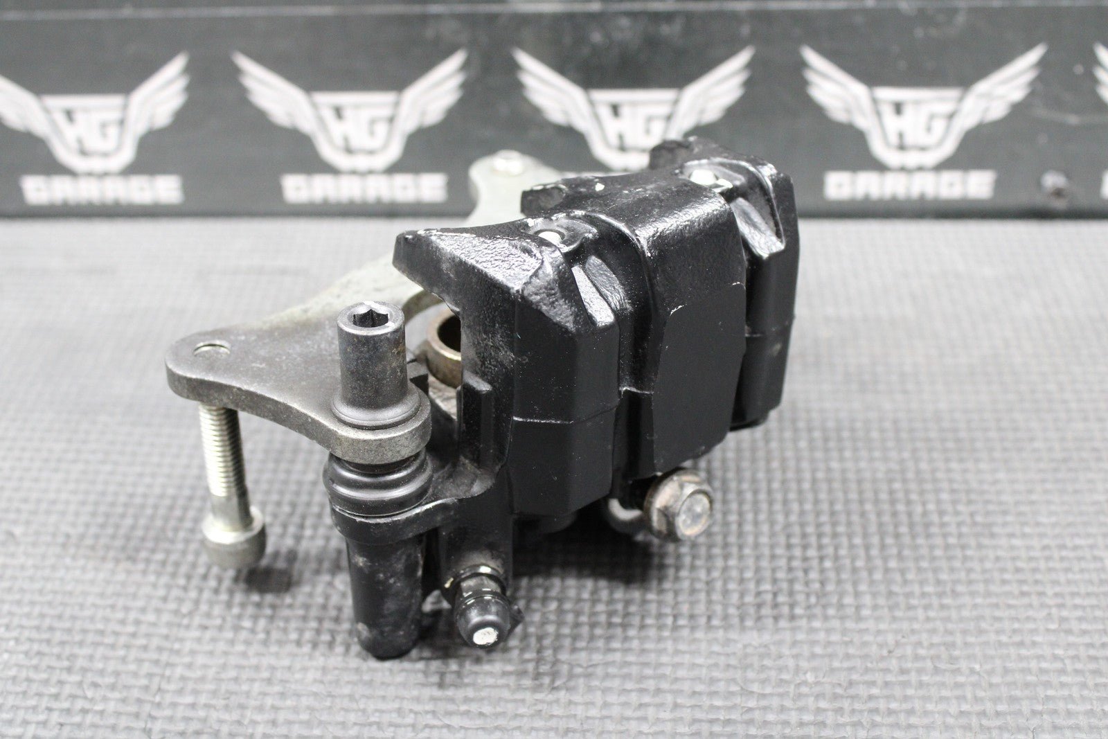 2009 2010 KAWASAKI KLX250SF OEM FRONT BRAKE CALIPER & BRACKET 43080 - 0064 - 25S - hggarage