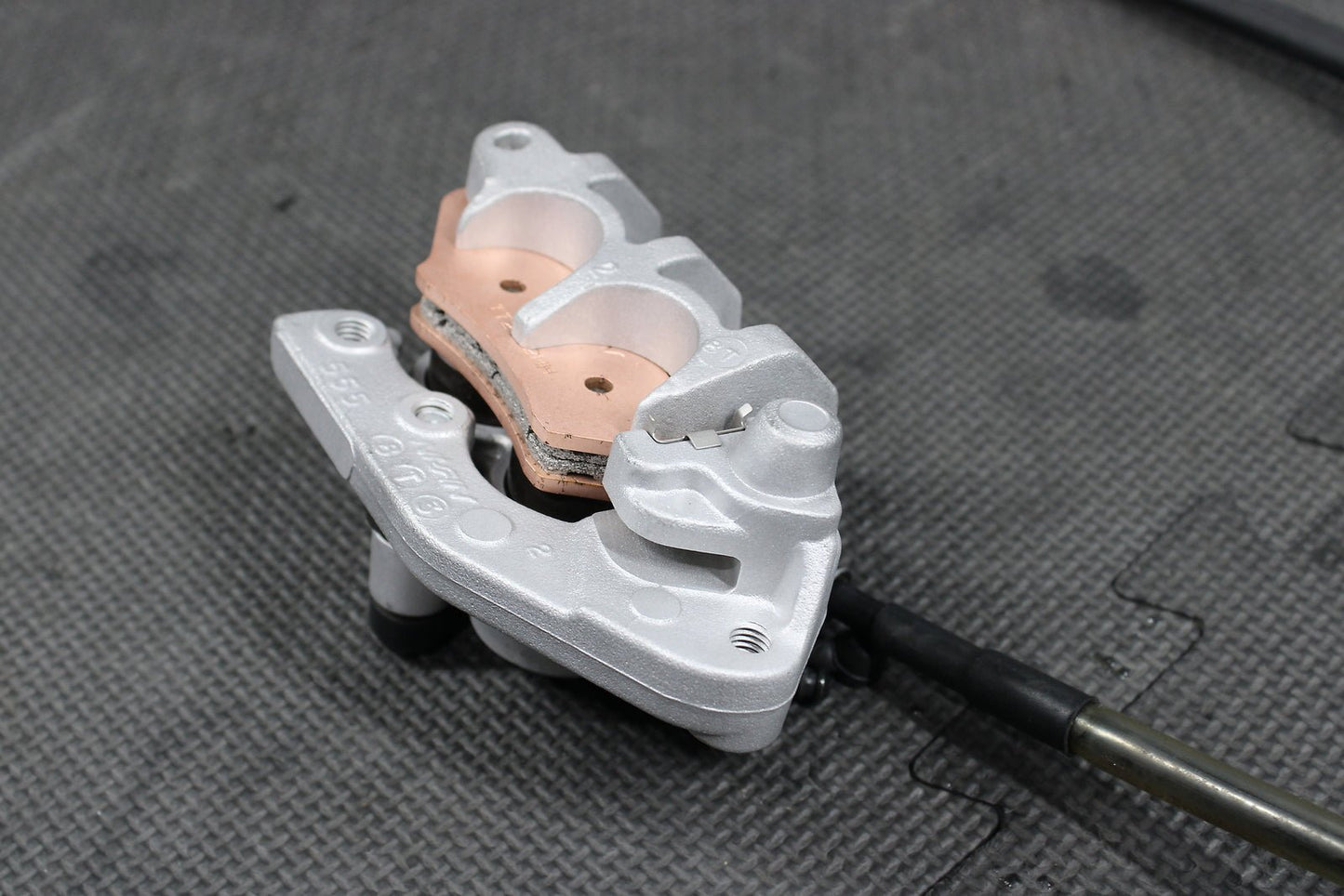 2009 Kawasaki KX250F OEM Nissin Front Brake Caliper Master Cylinder Complete - hggarage