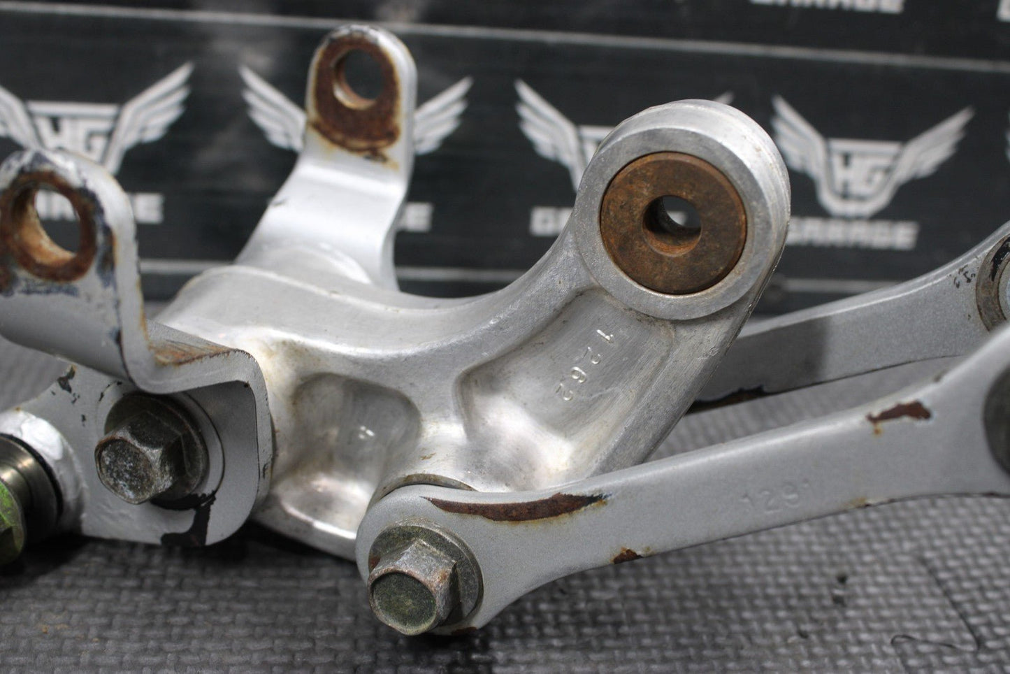 2001 KAWASAKI KX100 OEM REAR SHOCK LINKAGE RELAY ARM 39007 - 1262 - hggarage