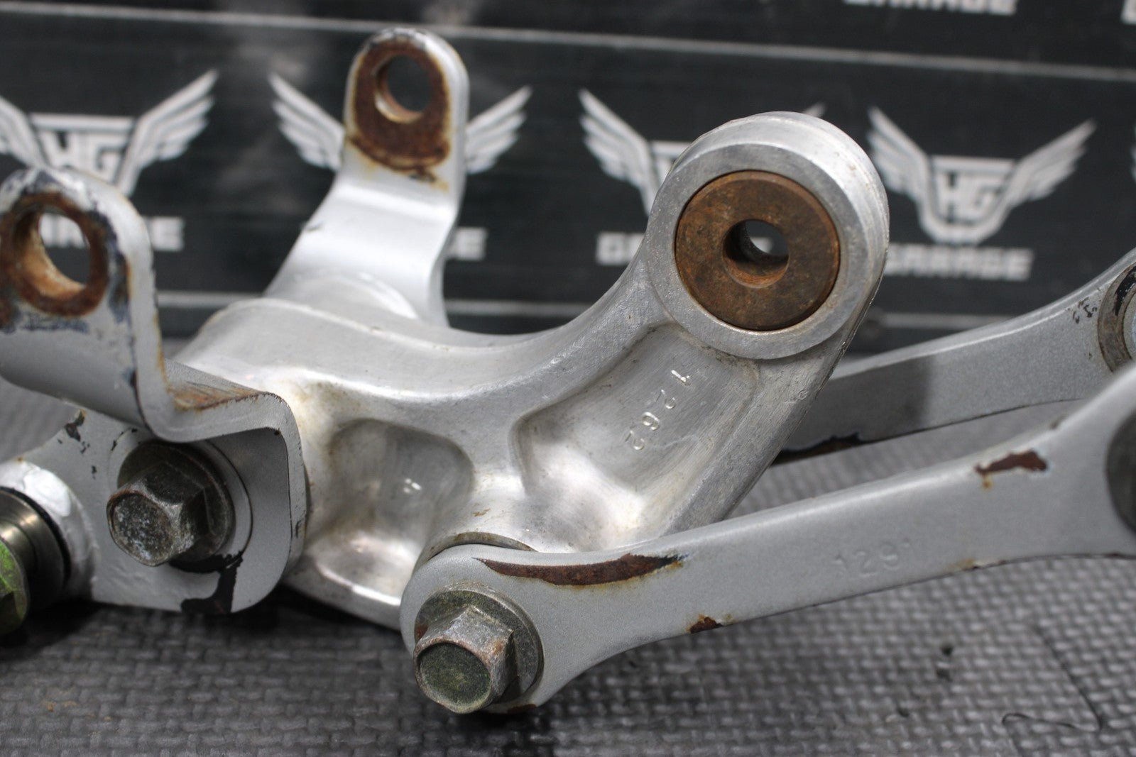 2001 KAWASAKI KX100 OEM REAR SHOCK LINKAGE RELAY ARM 39007 - 1262 - hggarage