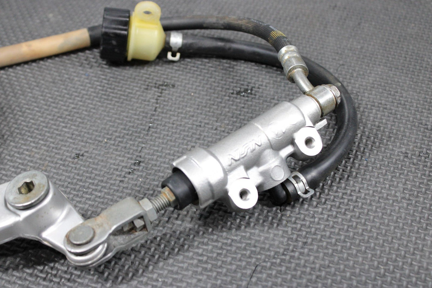 2014 KAWASAKI KX100 KX85 OEM NISSIN REAR BACK BRAKE MASTER CYLINDER W RESERVOIR - hggarage