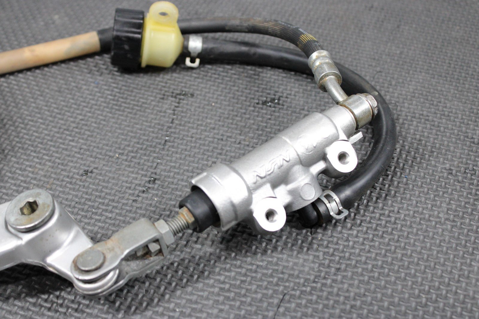 2014 KAWASAKI KX100 KX85 OEM NISSIN REAR BACK BRAKE MASTER CYLINDER W RESERVOIR - hggarage