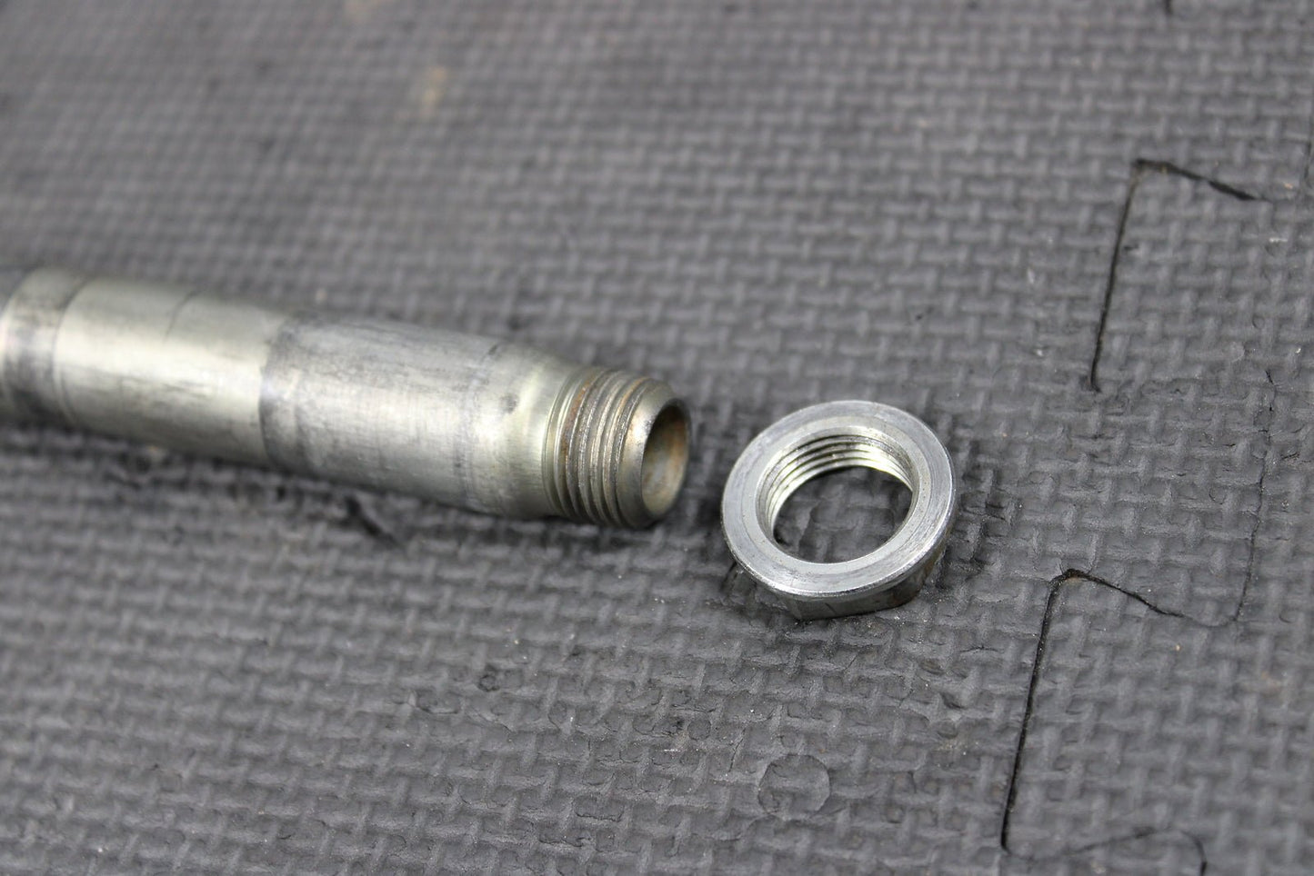 2012 KAWASAKI KX250F OEM FRONT WHEEL RIM AXLE PIVOT BOLT - hggarage