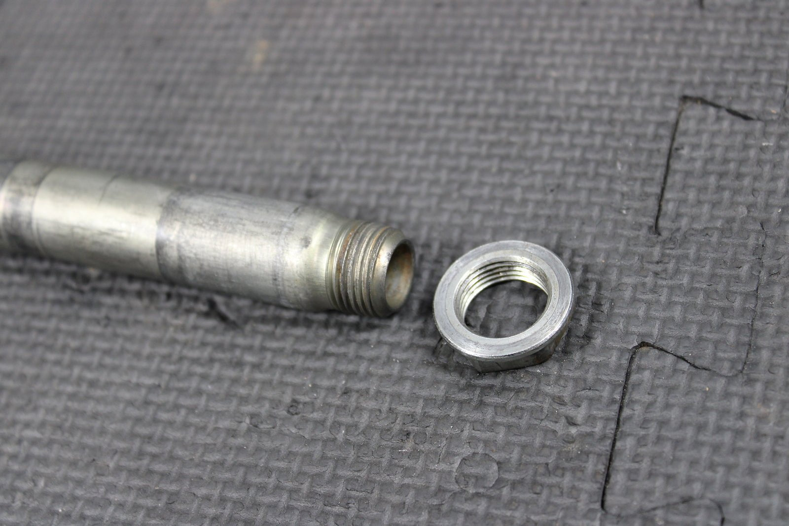 2012 KAWASAKI KX250F OEM FRONT WHEEL RIM AXLE PIVOT BOLT - hggarage