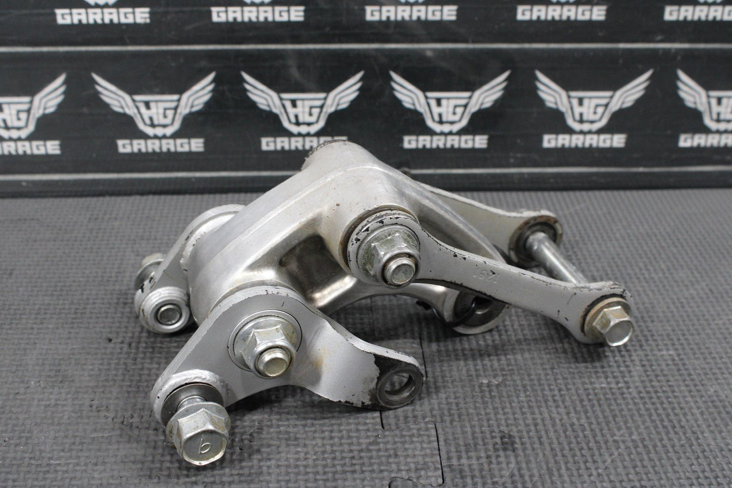 2014 KAWASAKI KX100 OEM REAR SHOCK LINKAGE RELAY ARM DOGBONE ASSEMBLY - hggarage