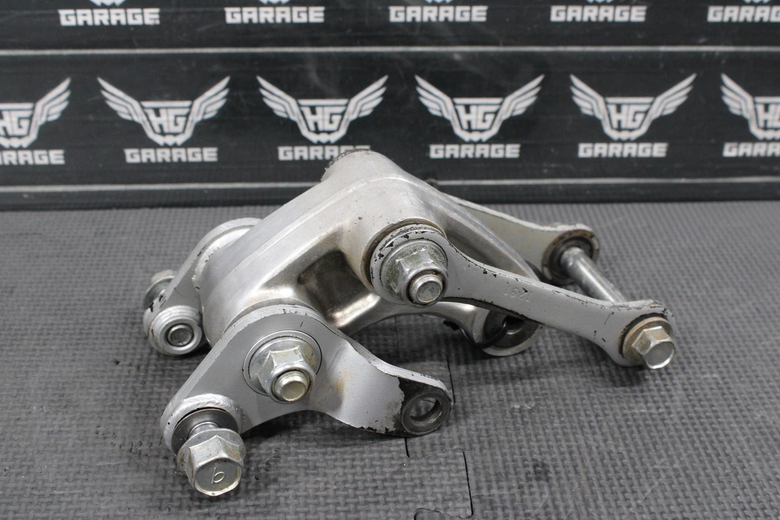 2014 KAWASAKI KX100 OEM REAR SHOCK LINKAGE RELAY ARM DOGBONE ASSEMBLY - hggarage