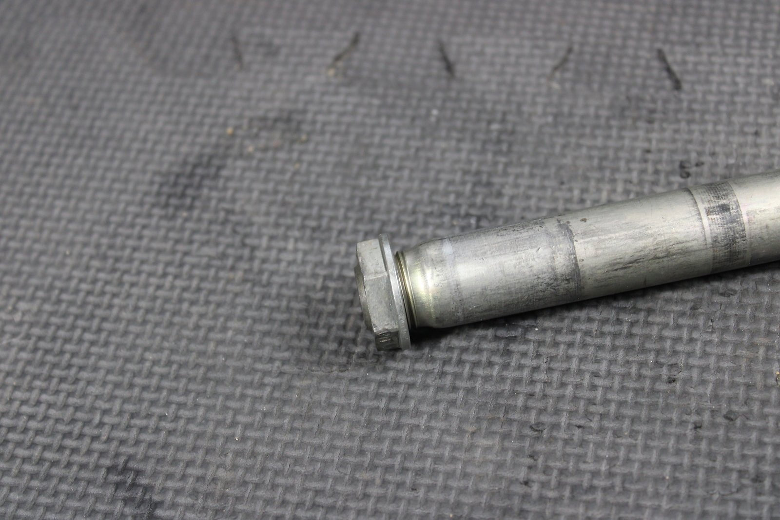 2012 KAWASAKI KX250F OEM FRONT WHEEL RIM AXLE PIVOT BOLT - hggarage