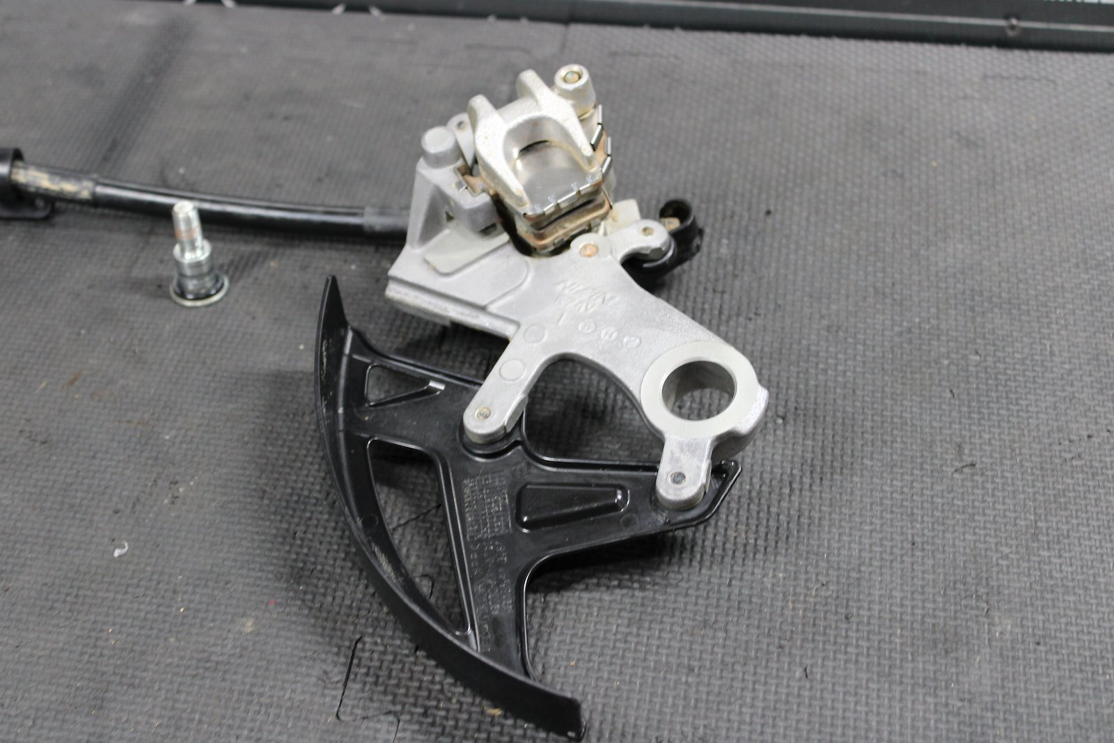 2016 HONDA CRF250R OEM NISSIN REAR BACK BRAKE CALIPER MASTER CYLINDER ASSEMBLY - hggarage