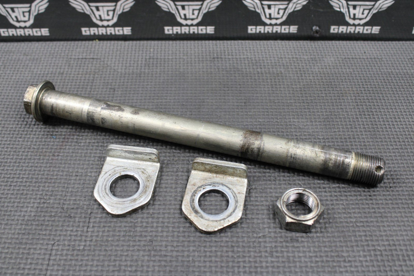 2009 KAWASAKI KLX250SF OEM REAR AXLE BACK WHEEL RIM PIVOT BOLT SHAFT 41068 - 0602 - hggarage