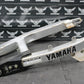 2003 YAMAHA TTR125 TTR125E SMALL WHEEL OEM SWINGARM SWING ARM SUSPENSION ARM