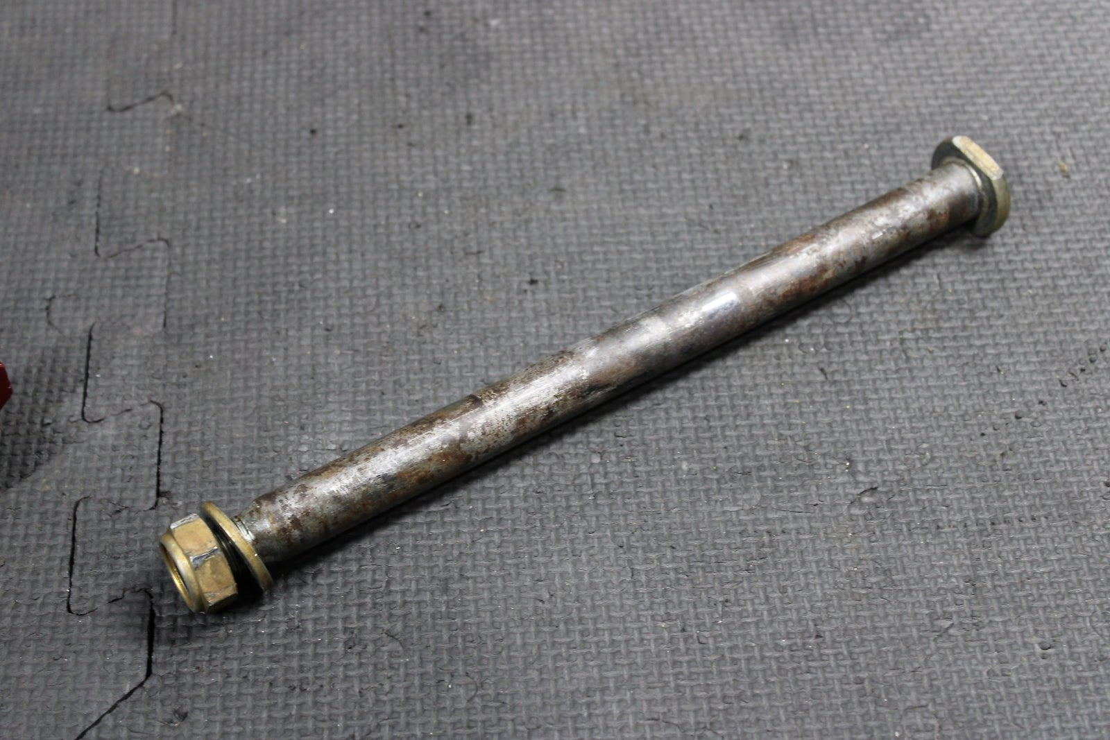 2005 HONDA OEM REAR AXLE BACK WHEEL RIM PIVOT BOLT AXEL SWINGARM PIVOTING BOLT - hggarage