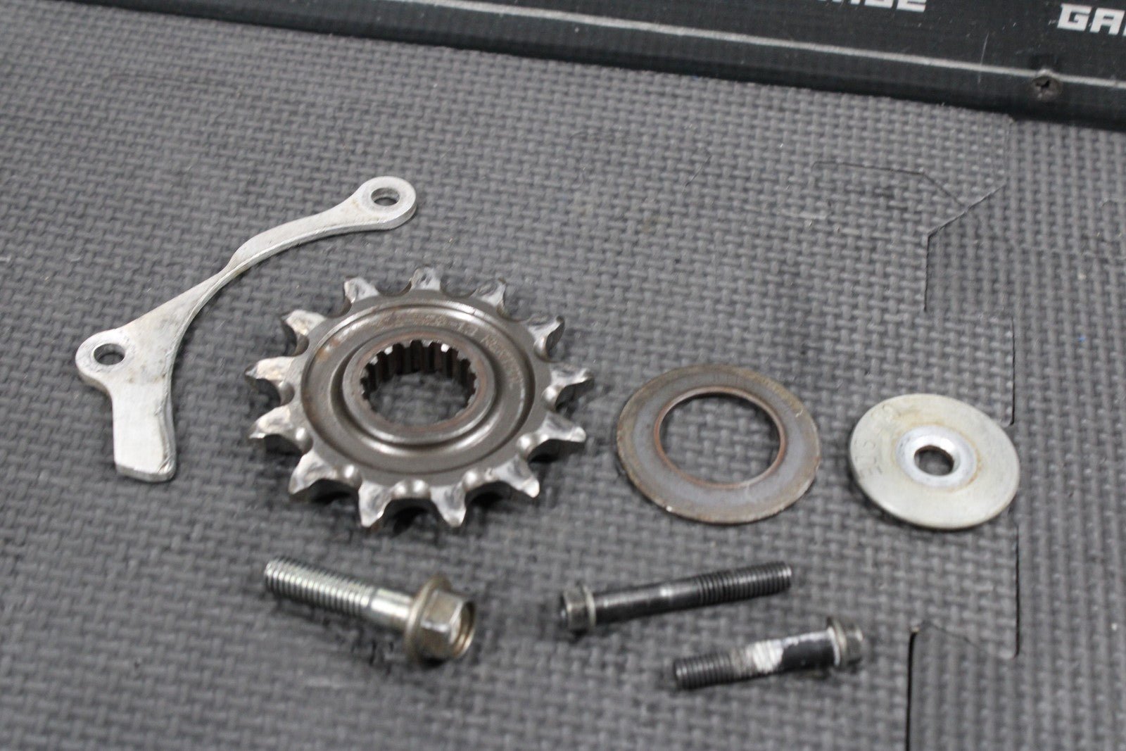 2023 Honda CRF250R OEM Motor Engine Front Sprocket Cover W Sprocket - hggarage