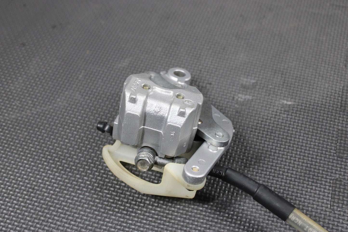 2003 KAWASAKI KX65 OEM NISSIN REAR BACK BRAKE CALIPER 43041 - 1711 43095 - 1228 - hggarage