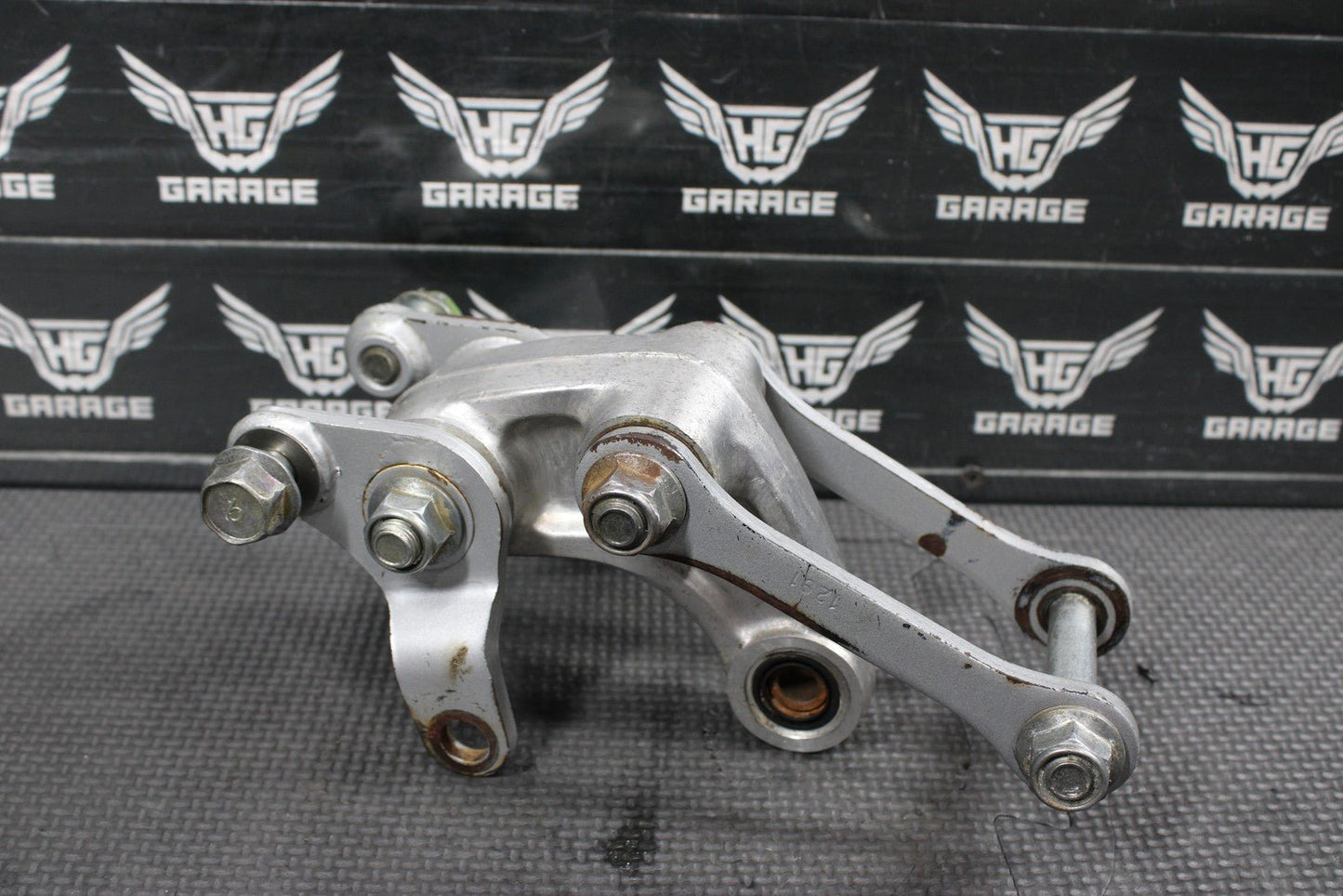2001 KAWASAKI KX100 OEM REAR SHOCK LINKAGE RELAY ARM 39007 - 1262 - hggarage
