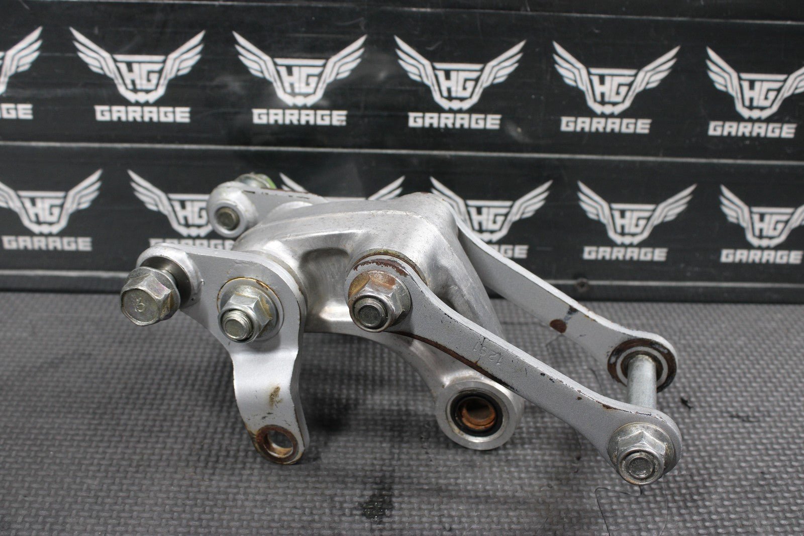 2001 KAWASAKI KX100 OEM REAR SHOCK LINKAGE RELAY ARM 39007 - 1262 - hggarage