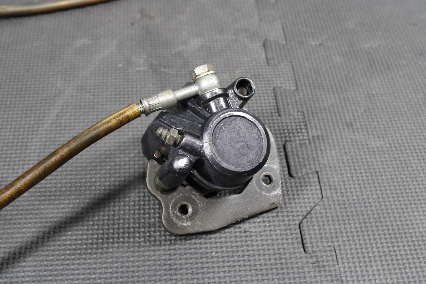 1986 KAWASAKI KDX200 OEM TOKICO FRONT BRAKE CALIPER MASTER CYLINDER ASSEMBLY - hggarage