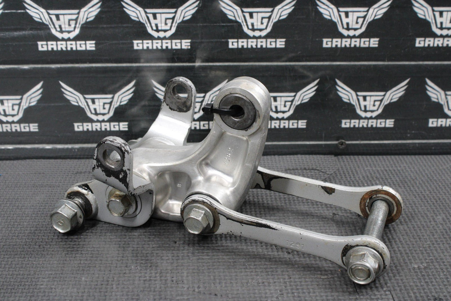 2014 KAWASAKI KX100 OEM REAR SHOCK LINKAGE RELAY ARM DOGBONE ASSEMBLY - hggarage