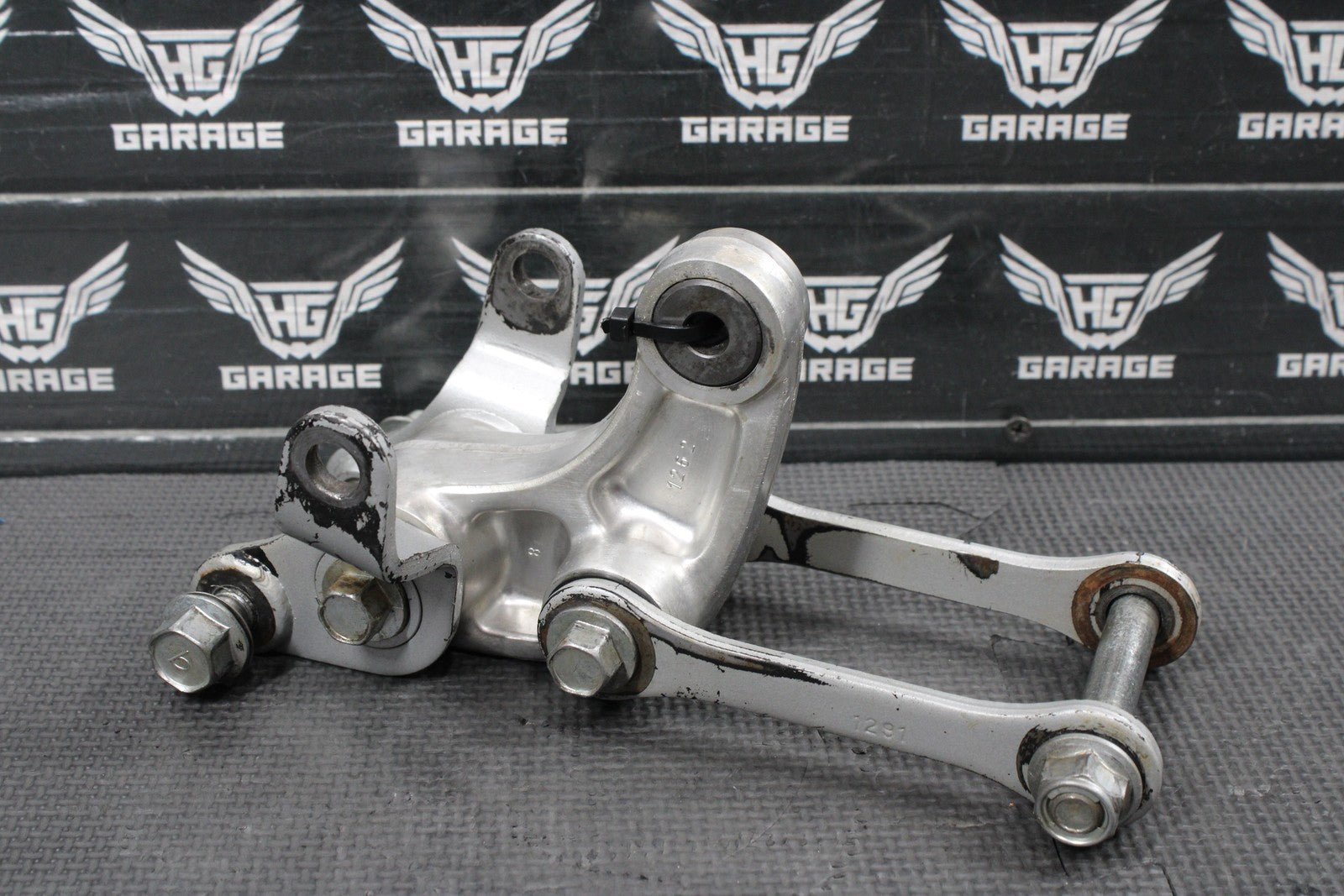 2014 KAWASAKI KX100 OEM REAR SHOCK LINKAGE RELAY ARM DOGBONE ASSEMBLY - hggarage