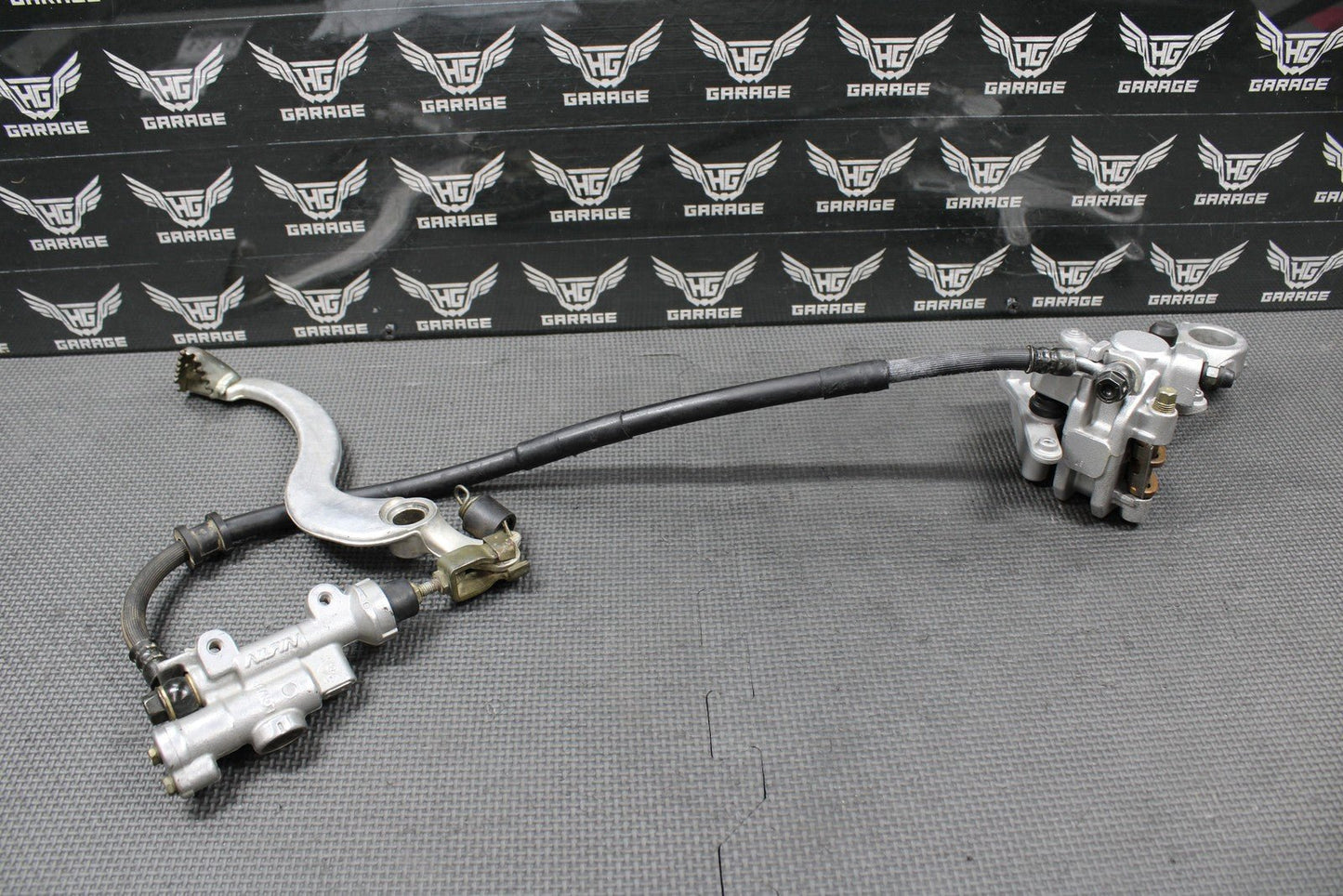 2005 HONDA 05 - 07 CRF450R OEM REAR BACK BRAKE CALIPER MASTER CYLINDER LEVER ASSY - hggarage