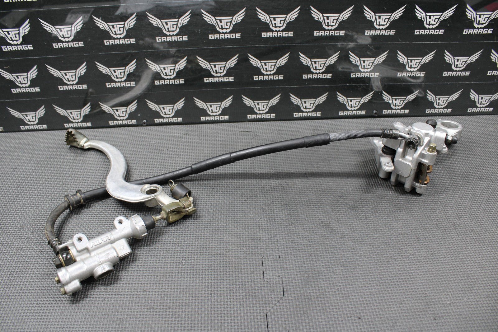 2005 HONDA 05 - 07 CRF450R OEM REAR BACK BRAKE CALIPER MASTER CYLINDER LEVER ASSY - hggarage