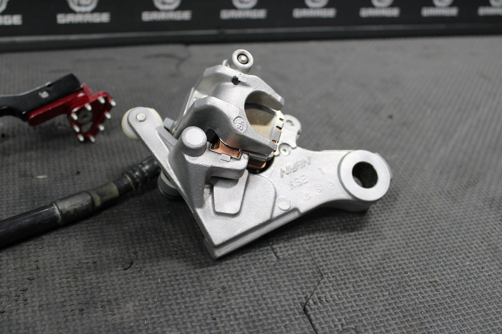 2009 Honda CRF150RB Expert Bigwheel OEM Nissin Rear Back Brake Caliper Master - hggarage