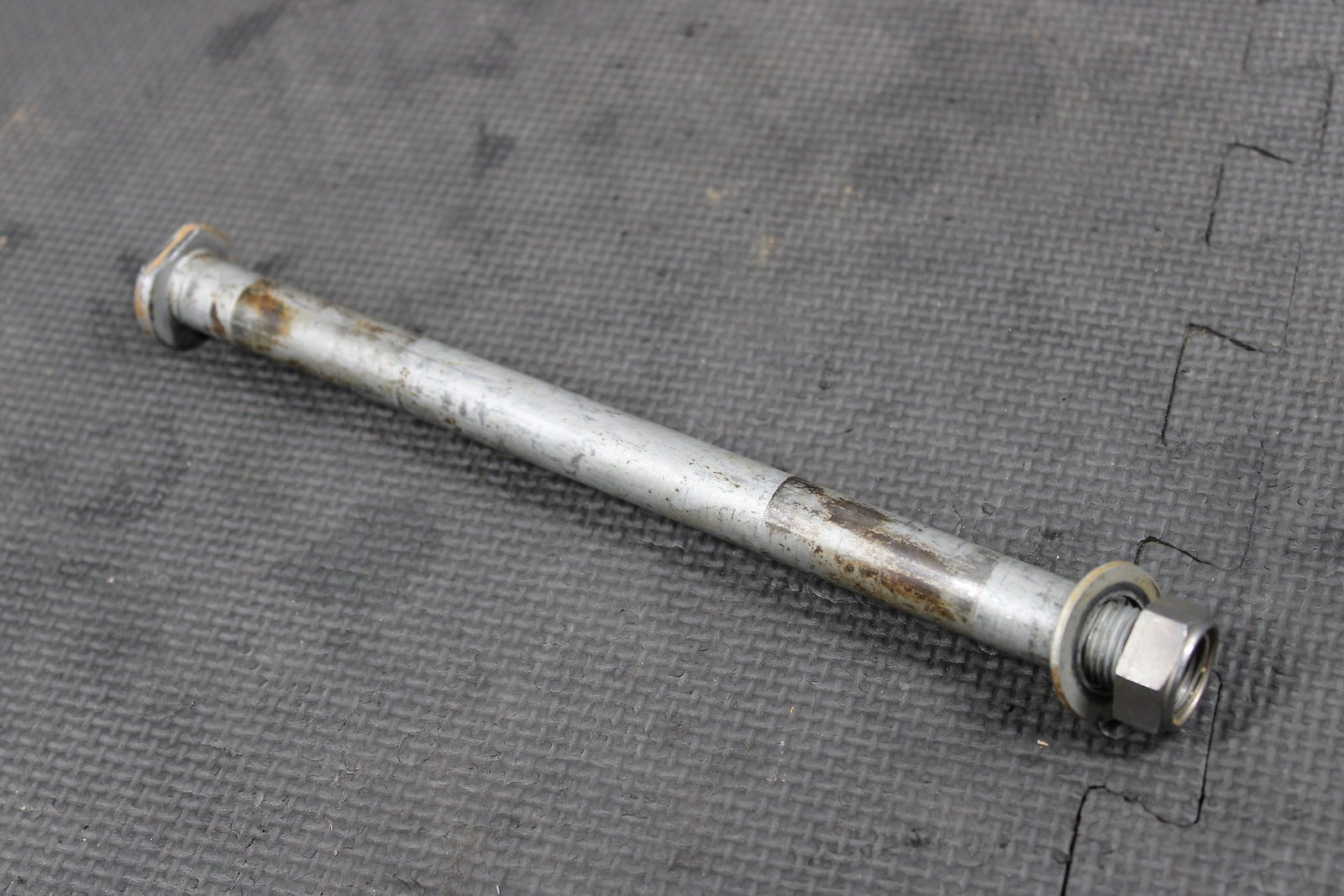2012 KAWASAKI KX250F OEM REAR BACK SWINGARM BOLT SUSPENSION PIVOT AXLE 33032 - 001 - hggarage