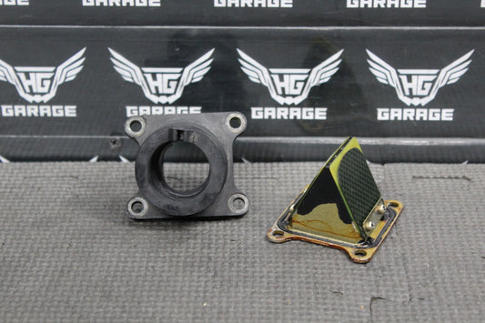 2002 KAWASAKI KX85 OEM INTAKE REED BLOCK ASSEMBLY CARBURATOR HOLDER