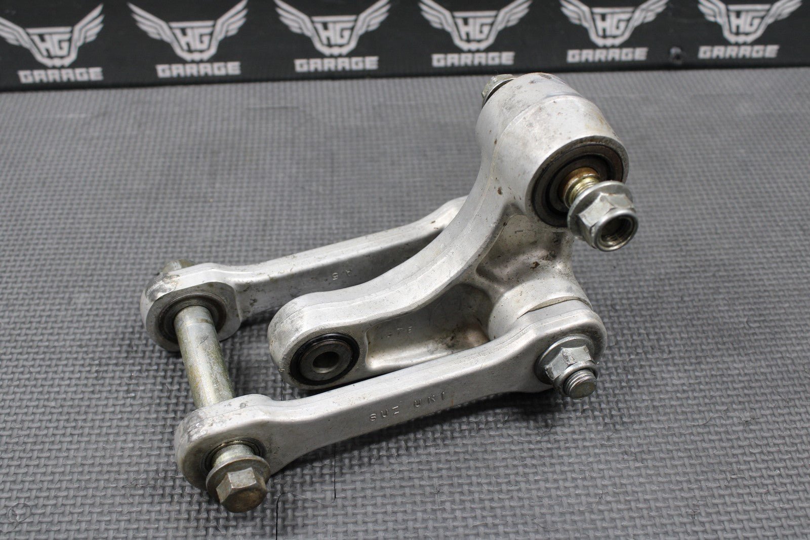 1999 98 - 99 SUZUKI RM125 OEM REAR SHOCK SWINGARM LINKAGE LINKS LEVER 62600 - 37820 - hggarage