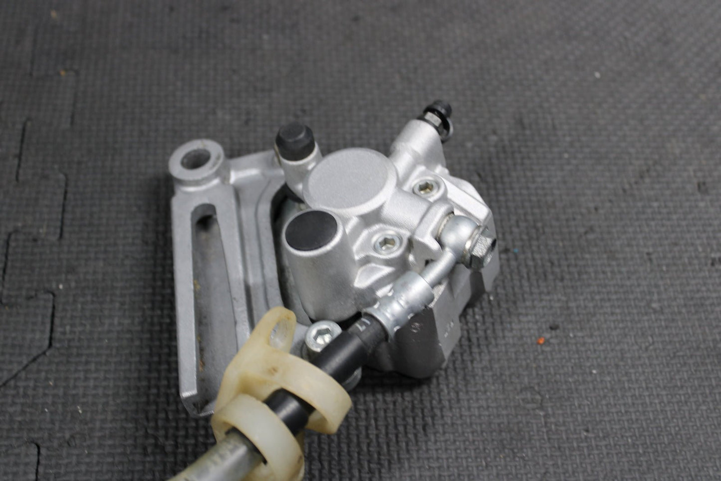1995 KAWASAKI KX80 OEM NISSIN REAR BACK BRAKE CALIPER MASTER CYLINDER ASSEMBLY - hggarage