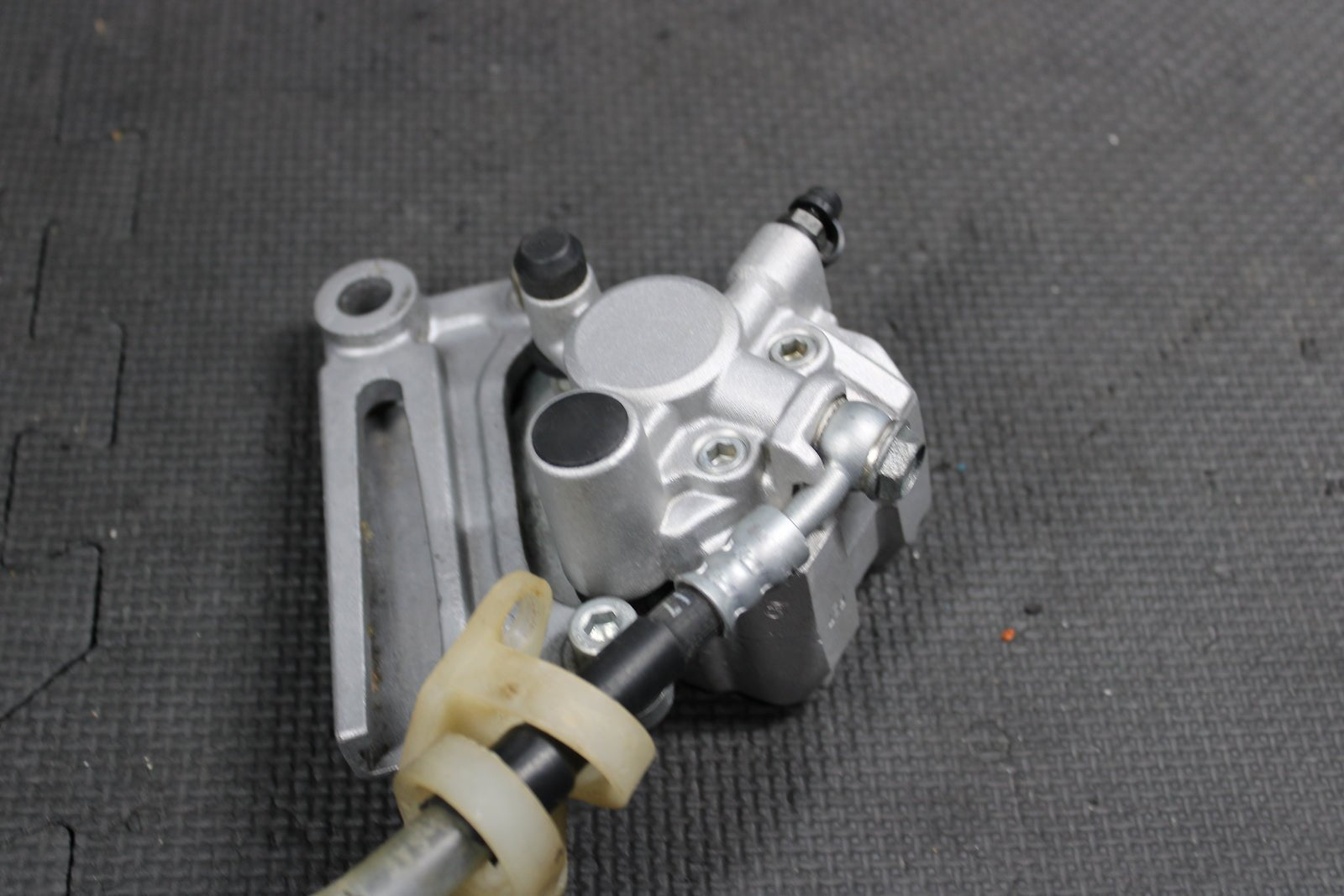 1995 KAWASAKI KX80 OEM NISSIN REAR BACK BRAKE CALIPER MASTER CYLINDER ASSEMBLY - hggarage