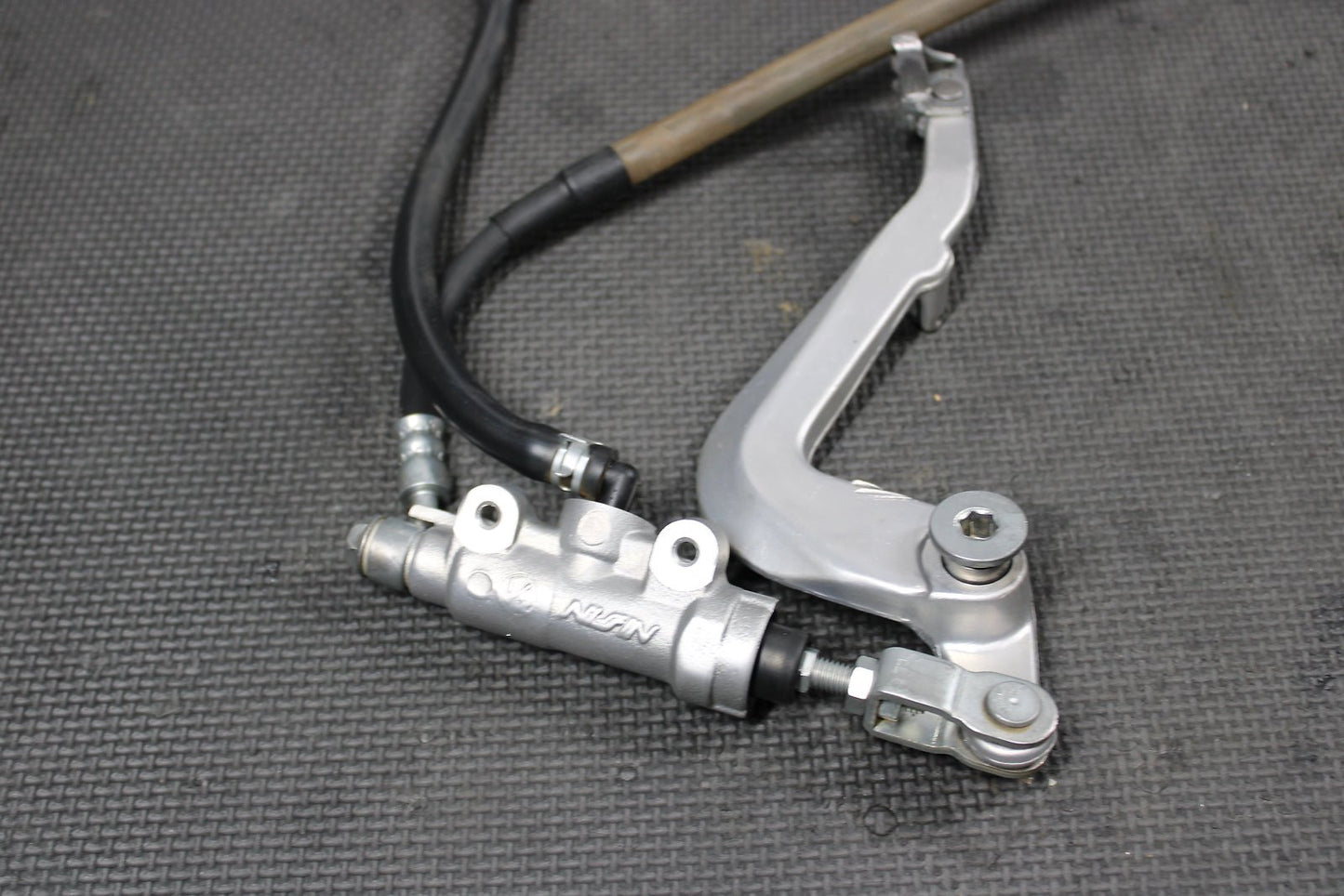 2016 KAWASAKI KX85 OEM NISSIN REAR BACK BRAKE CALIPER MASTER CYLINDER LEVER - hggarage