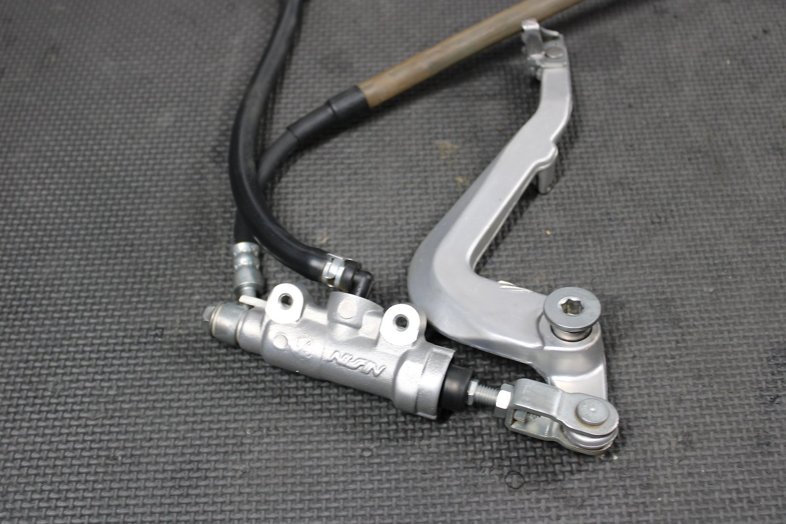 2016 KAWASAKI KX85 OEM NISSIN REAR BACK BRAKE CALIPER MASTER CYLINDER LEVER - hggarage
