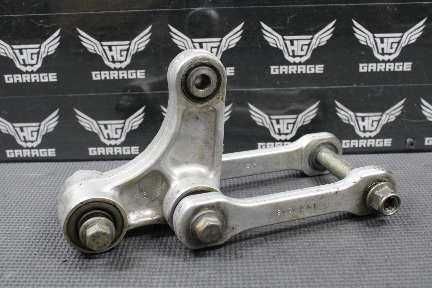 1999 98 - 99 SUZUKI RM125 OEM REAR SHOCK SWINGARM LINKAGE LINKS LEVER 62600 - 37820 - hggarage