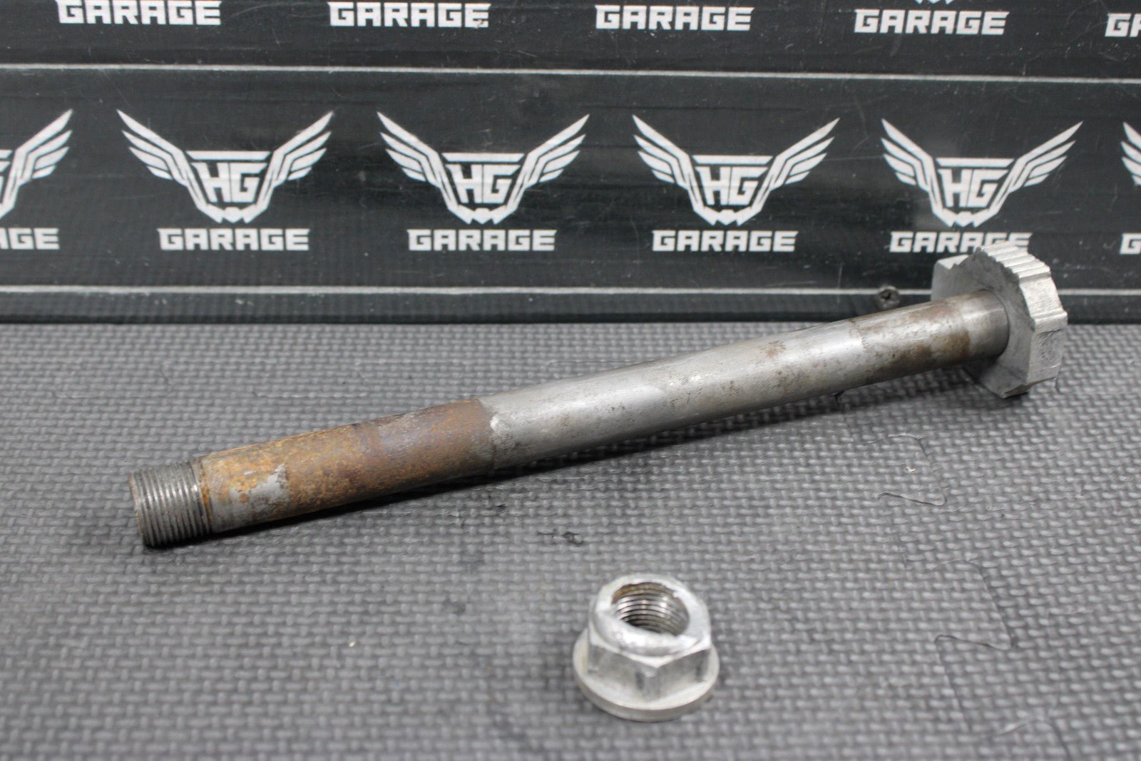 2000 KTM 250 EXC OEM REAR AXLE BACK WHEEL RIM PIVOT BOLT AXEL 77310085044 - hggarage