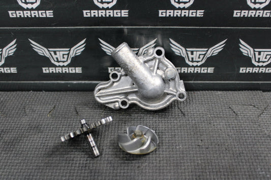 2003 KAWASAKI KX125 OEM ENGINE WATER PUMP W HOUSING 16142 - 1173 - hggarage