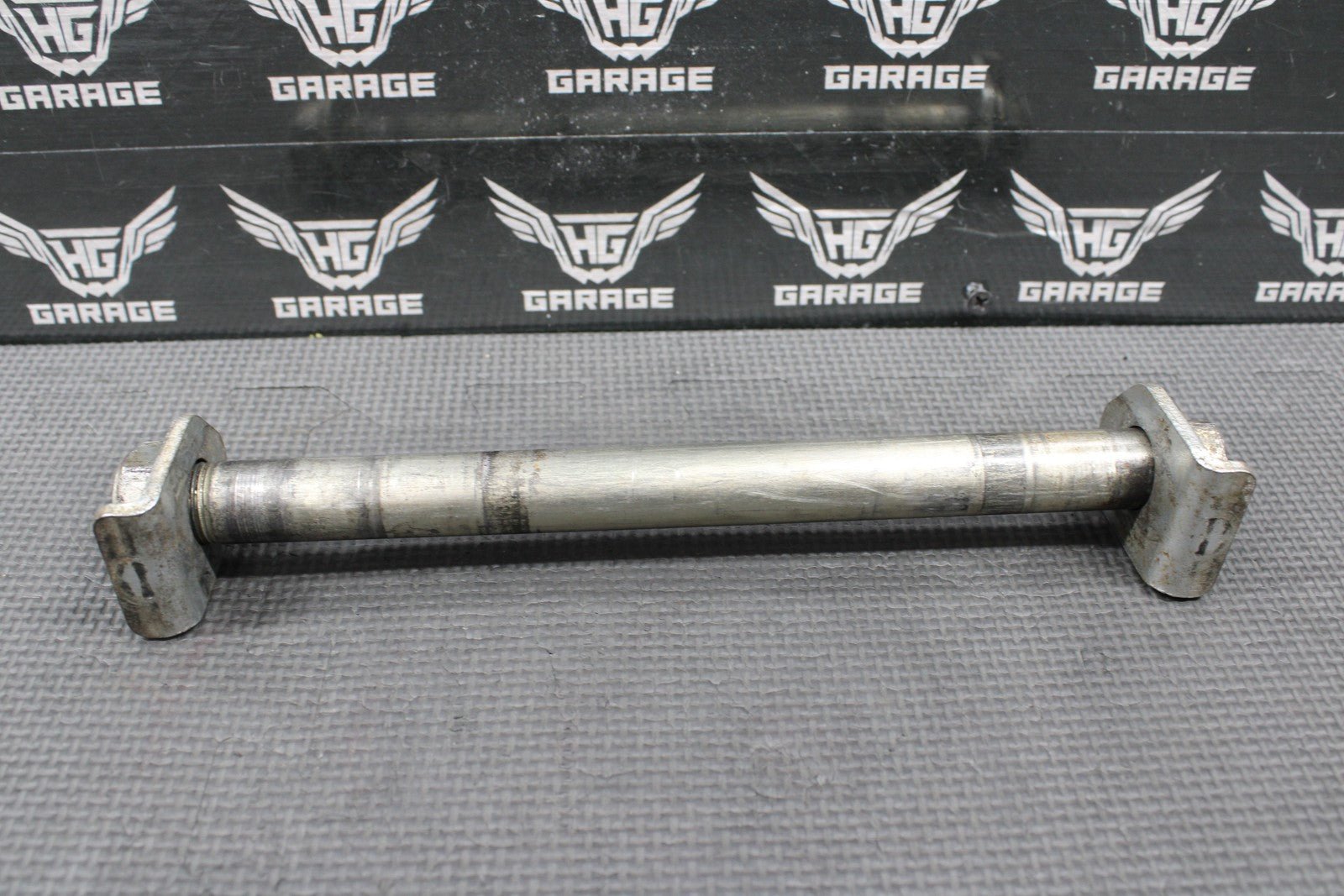 2009 KAWASAKI KLX250SF OEM REAR AXLE BACK WHEEL RIM PIVOT BOLT SHAFT 41068 - 0602 - hggarage