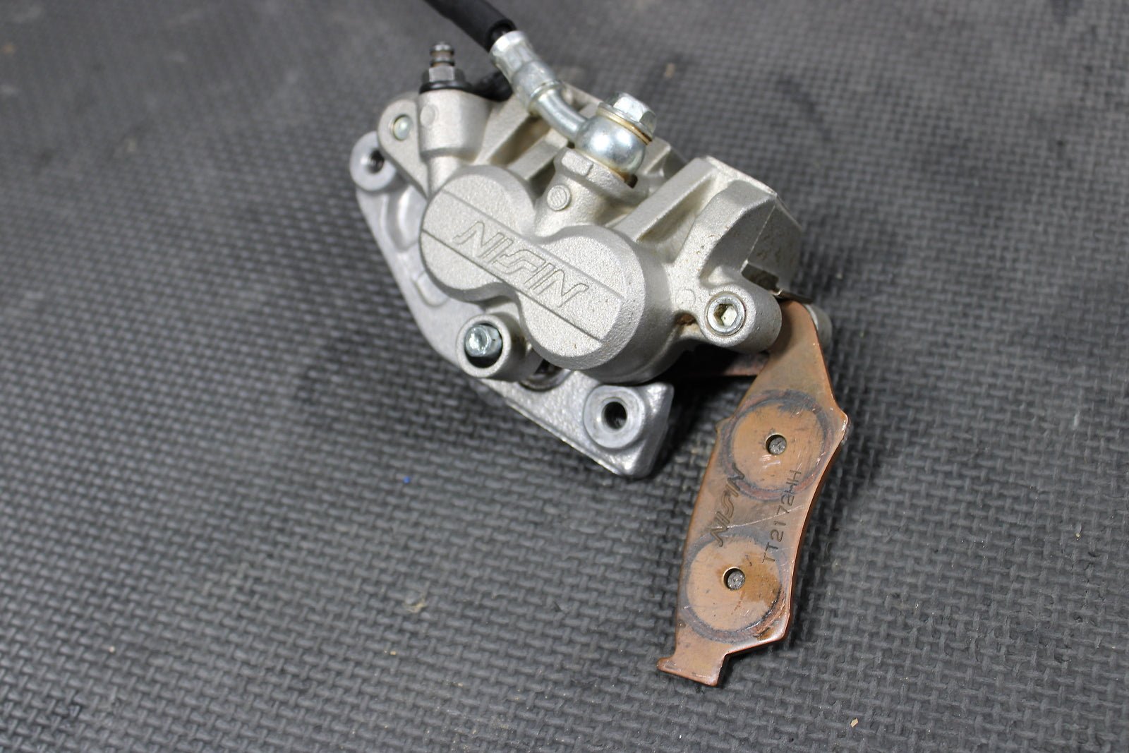 2012 KAWASAKI KX250F OEM NISSIN FRONT BRAKE CALIPER MASTER CYLINDER ASSEMEMBLY - hggarage