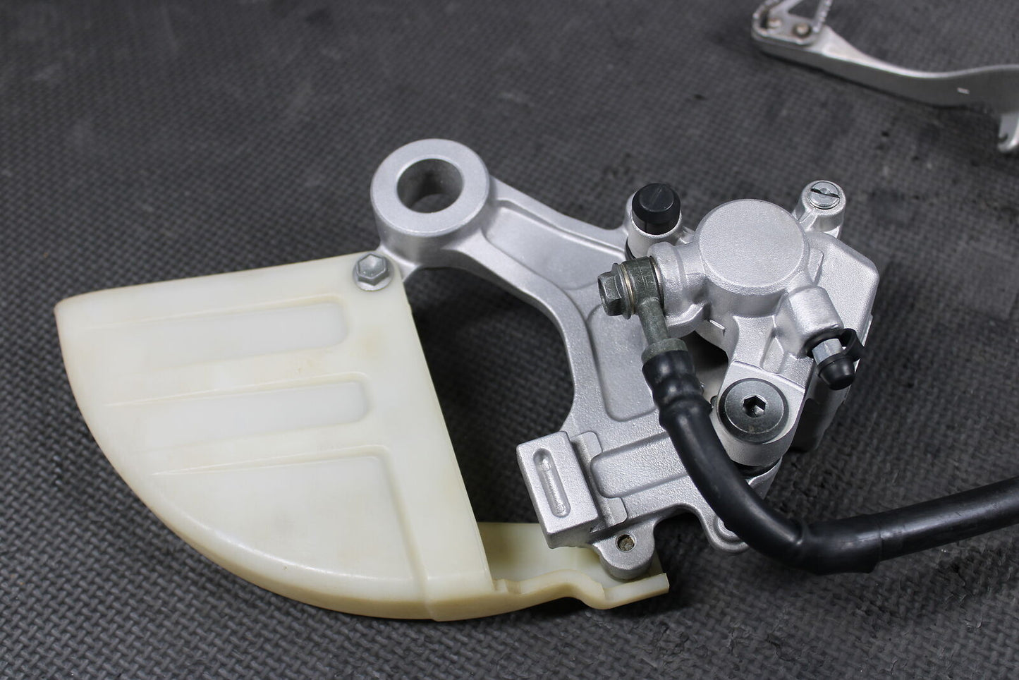 2004 SUZUKI RM125 RM250 OEM NISSIN REAR BACK BRAKE CALIPER MASTER CYLINDER LEVER