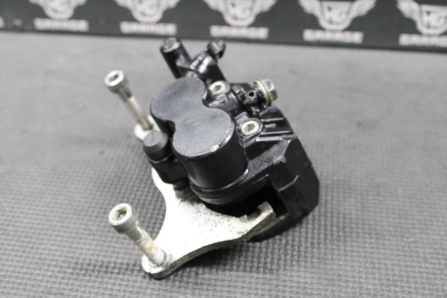 2009 2010 KAWASAKI KLX250SF OEM FRONT BRAKE CALIPER & BRACKET 43080 - 0064 - 25S - hggarage