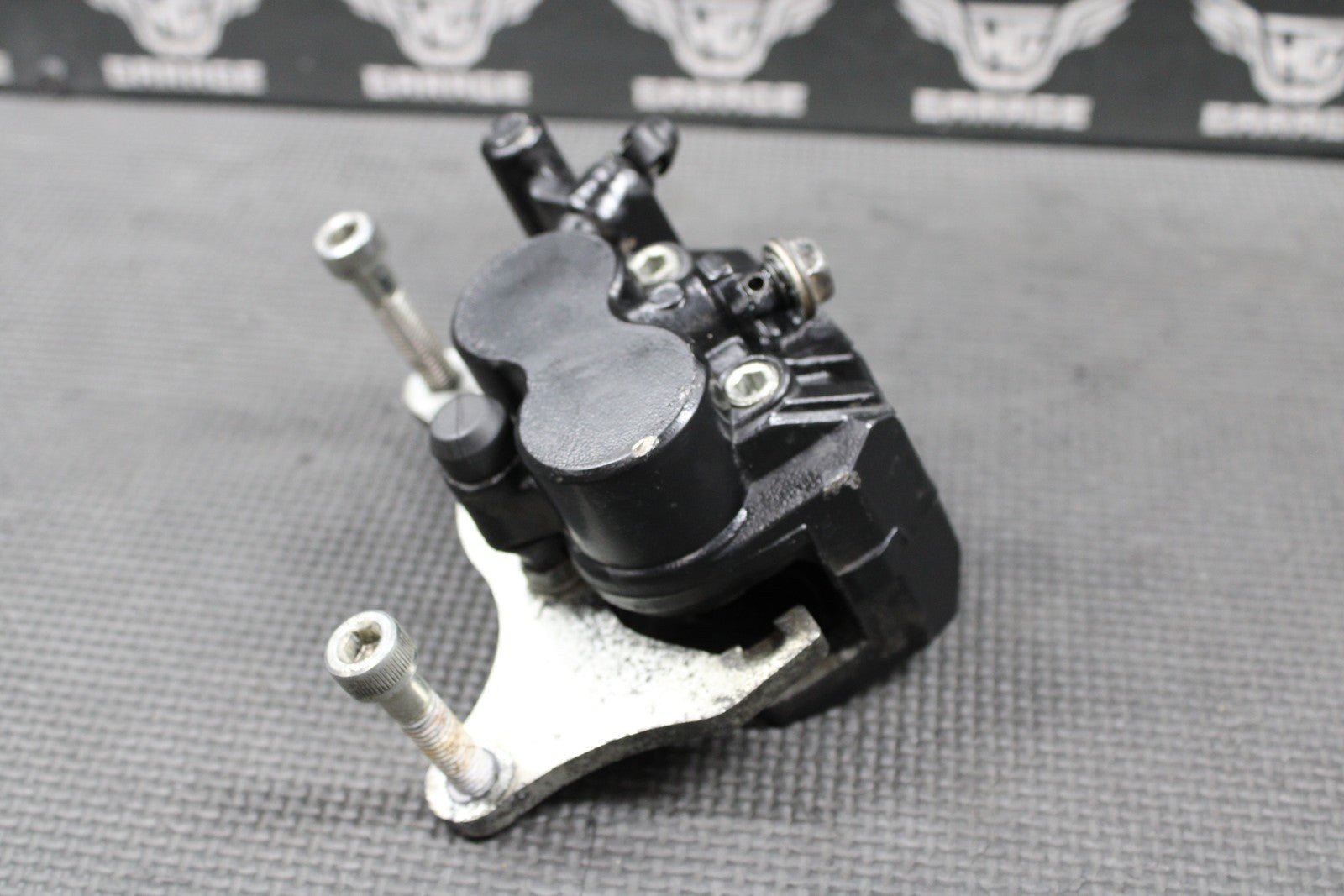 2009 2010 KAWASAKI KLX250SF OEM FRONT BRAKE CALIPER & BRACKET 43080 - 0064 - 25S - hggarage