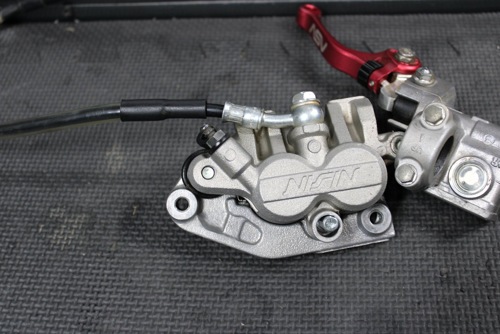 2012 KAWASAKI KX250F OEM NISSIN FRONT BRAKE CALIPER MASTER CYLINDER ASSEMEMBLY - hggarage