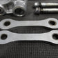 1994 KAWASAKI KX125 OEM REAR SHOCK LINKAGE LINKS DOGBONE ROD ARM 39007 - 1228 - hggarage