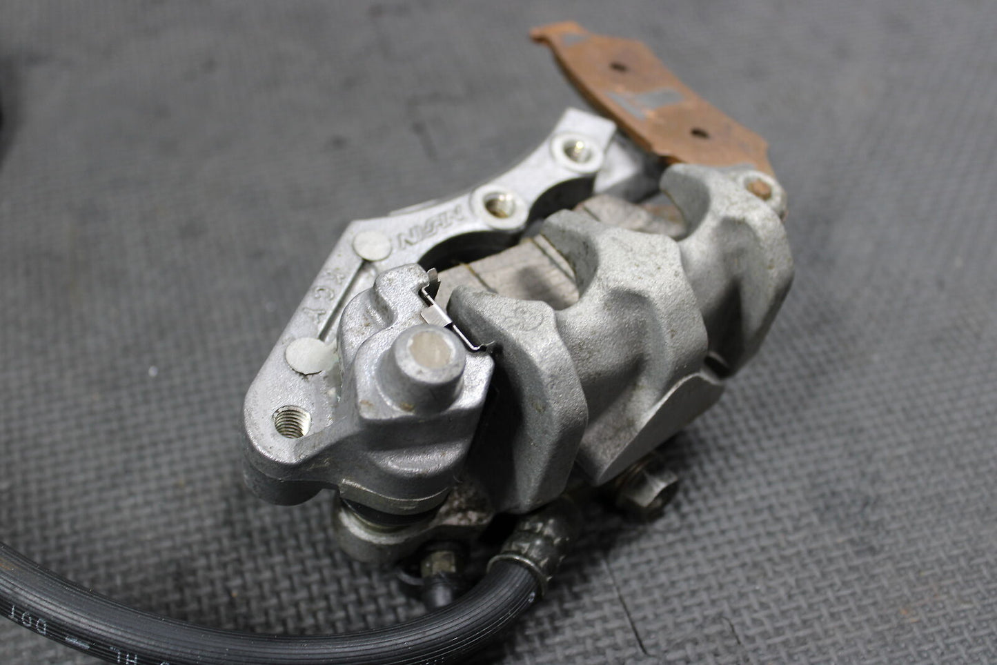 2004 HONDA CRF150F OEM NISSIN FRONT BRAKE CALIPER MASTER CYLINDER ASSEMBLY