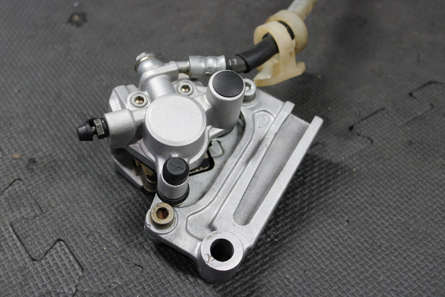 1995 KAWASAKI KX80 OEM NISSIN REAR BACK BRAKE CALIPER MASTER CYLINDER ASSEMBLY - hggarage