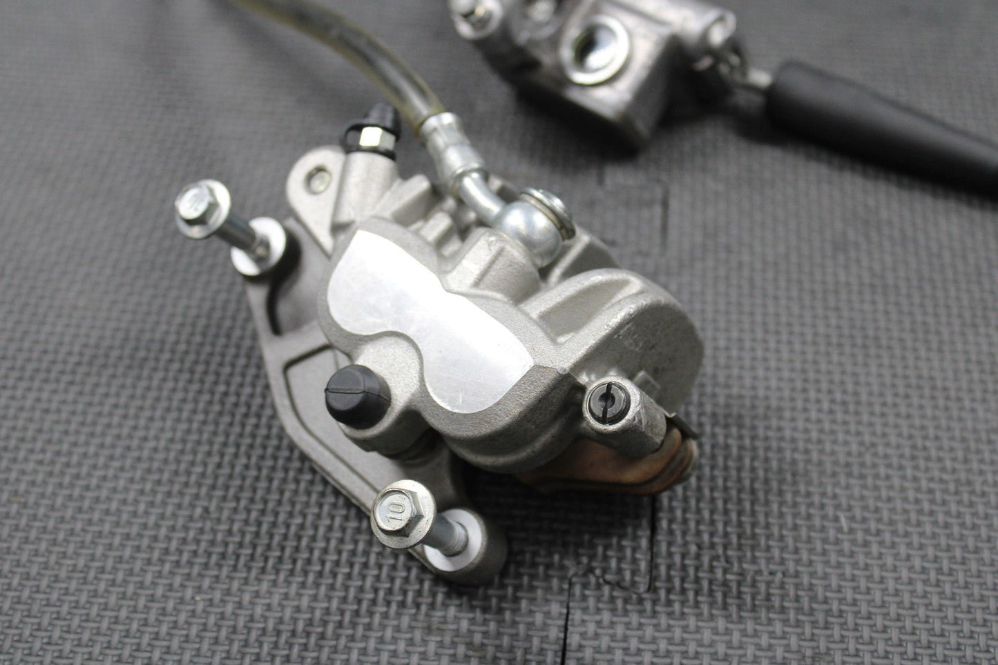 2019 SUZUKI 19 - 25 RMZ250 RMZ450 OEM FRONT BRAKE CALIPER MASTER CYLINDER LEVER - hggarage